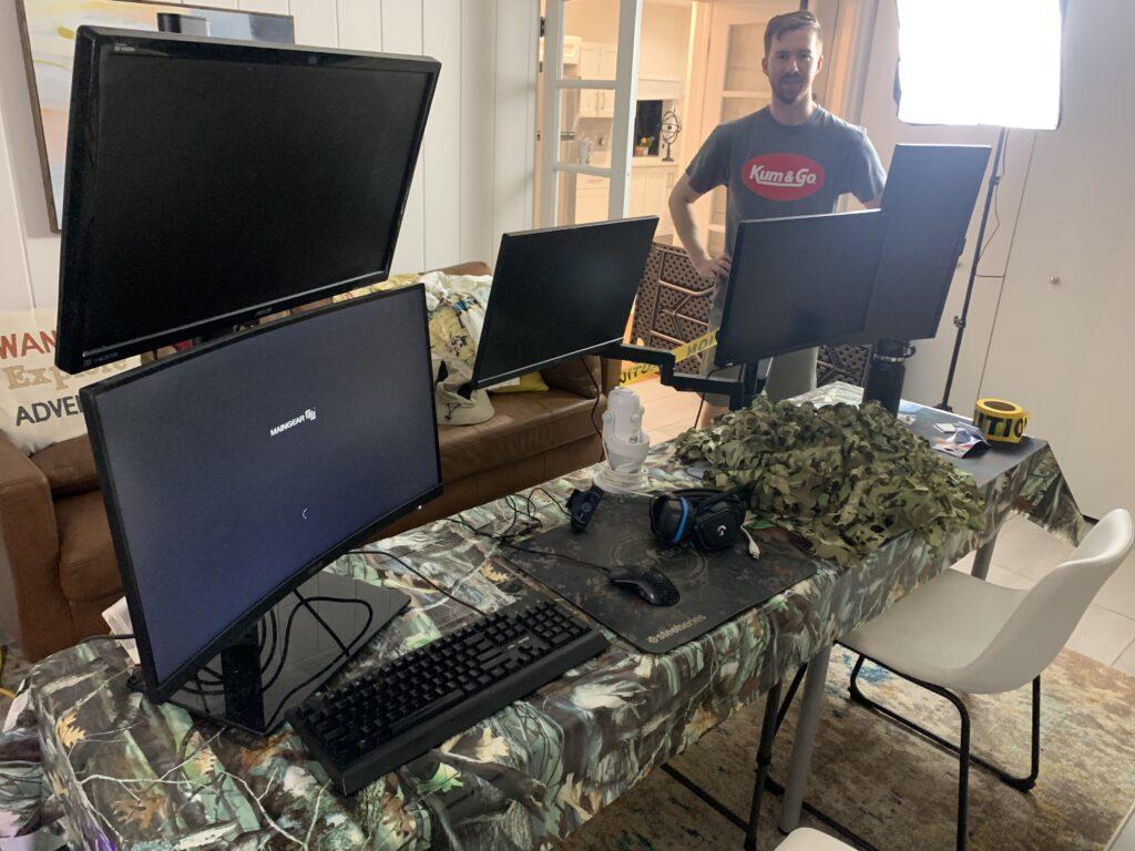 Pre-stream desk setup with camo netting.